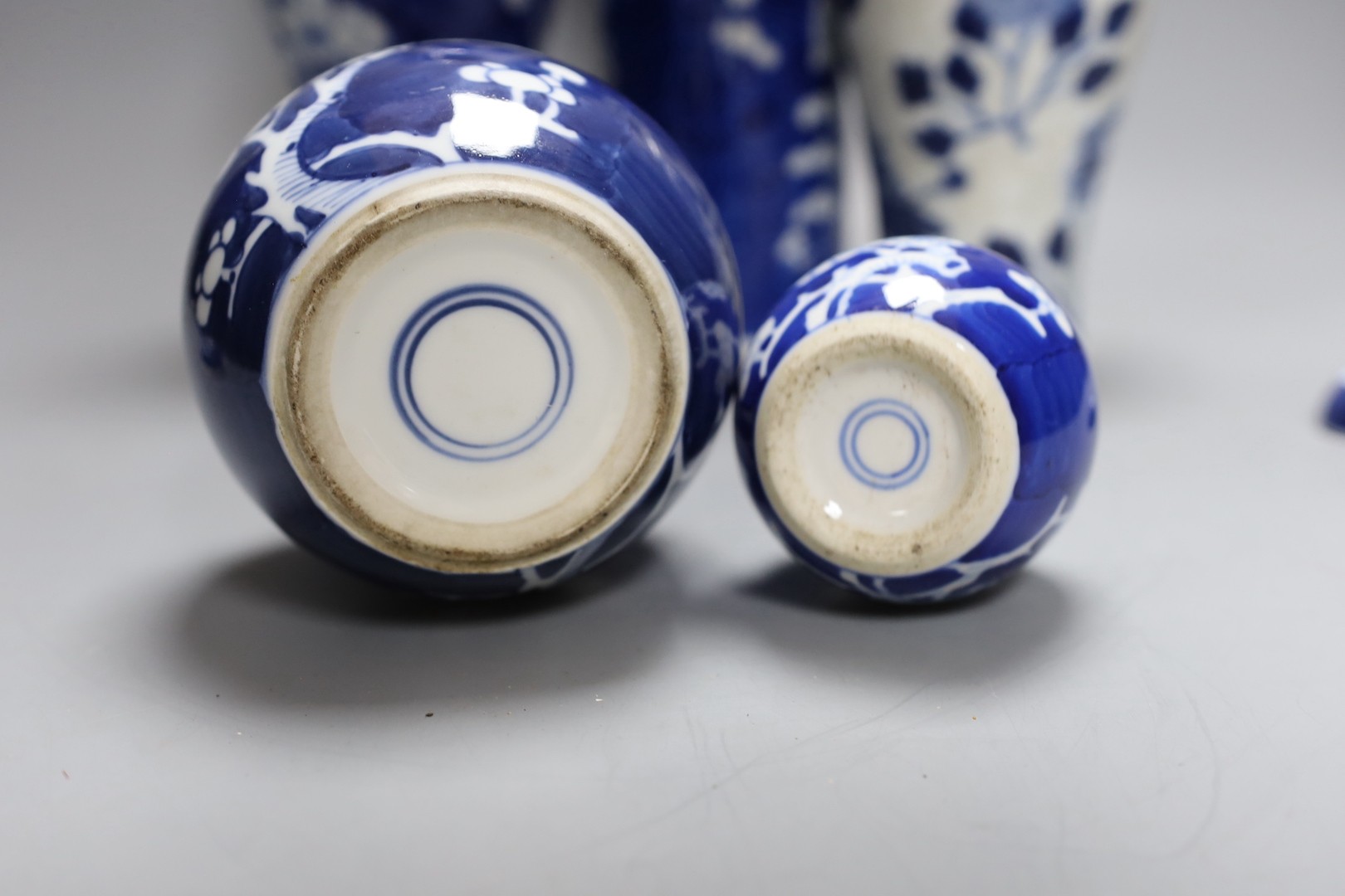 Five 19th century blue and white Chinese ceramics including vases and gingers jars with covers, tallest 26cm